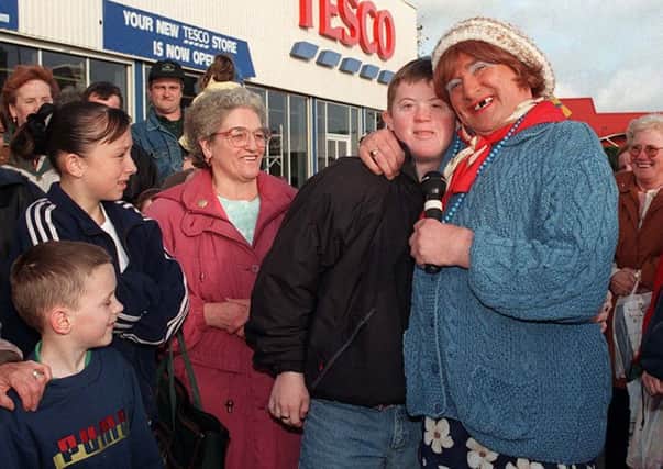 Belfasts favourite housewife May McFetteridge officially opens the latest Tesco store on the Donegal road in Belfast