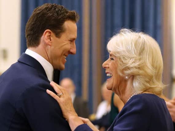 File photo dated 22/11/17 of the Duchess of Cornwall with professional dancer Brendan Cole, as reports have emerged that the 41-year-old Strictly Come Dancing star was axed from the show after 14 years for breaching royal protocol when he asked Camilla to waltz during a tea dance