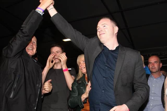 Chris Hazzard celebrates after winning the south Down Westminster seat for Sinn Fein