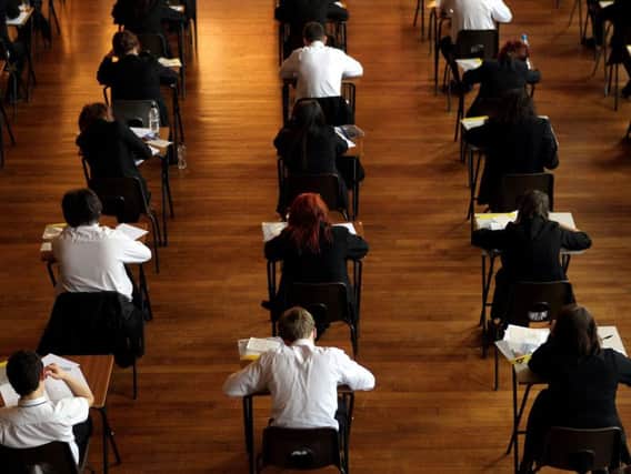 Some pupils sitting GCSEs in Northern Ireland have the reading age of a 13-year-old, a survey says.