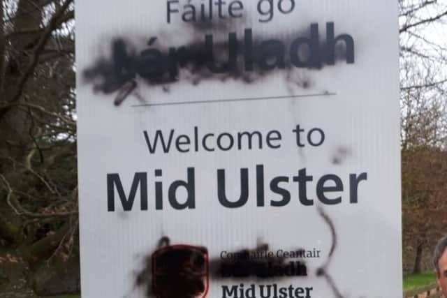 The vandalised road sign outside Caledon