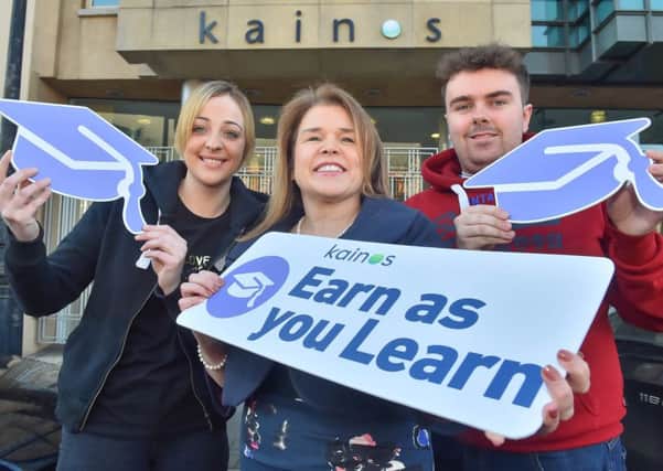 Earn As You Learn graduate Leah Fullerton and current student Peter Bonar join Colette Kidd, chief people officer at Kainos, to announce the companys Â£10million investment in future tech talent