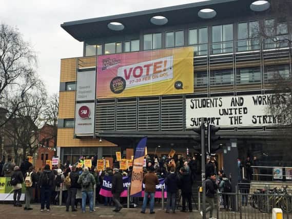 Demonstrators outside Queen's University Belfast (QUB), as a five-day walkout at QUB and Ulster University (UU), either side of this weekend began on Thursday in a dispute over pensions.