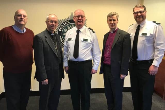Published on Twitter, February 21, 2018 (by @ACCMartinPSNI) this image shows (L-R) canon David Porter, archbishop Justin Welby, chief constable George Hamilton, bishop Tim Thornton, and assistant chief constable Stephen Martin, at PSNI Headquarters in east Belfast