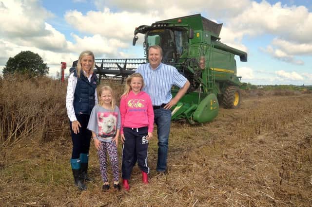 Carla Lockhart MLA with local farmer Tim McClelland and his family.