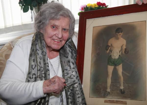 Rosie celebrated her 100th birthday on Friday, Februrary 23 at her south Belfast home. Also pictured is her champion boxer husband Billy. Picture by Bill Smyth