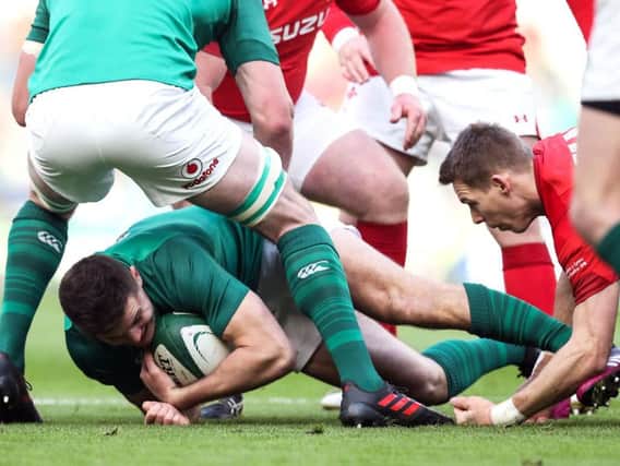 Jacob Stockdale crosses for the opening try in the Ireland v Wales game in Dublin
