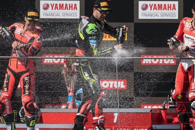 Reigning World Superbike champion Jonathan Rea celebrates his runner-up finish at Phillip Island.