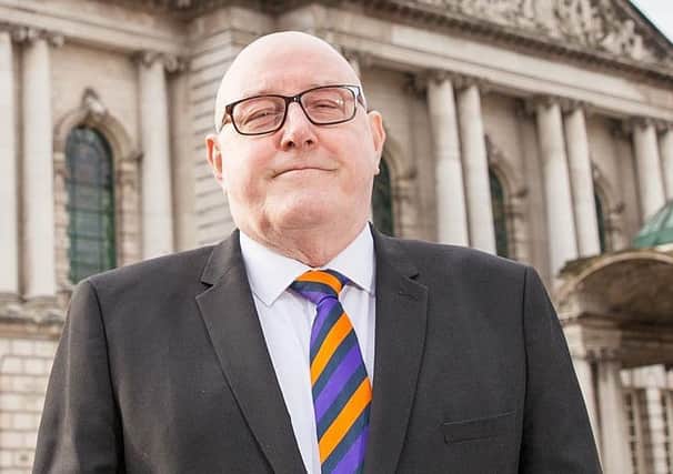 Senior Orangeman Spencer Beattie is said to have walked his lesbian daughter down the aisle at a same-sex civil partnership service as a loving father