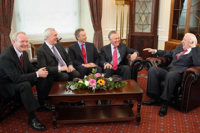From left: Deputy First Minister Martin McGuinness, Irish Taoiseach Bertie Ahern, British Prime Minister Tony Blair, Northern Ireland Secretary Peter Hain and First Minister  Ian Paisley, in the First Minister's office at the Northern Ireland Assembly, Stormont today. PRESS ASSOCIATION Photo. Picture date: Tuesday May 8, 2007.The Rev Ian Paisley and Martin McGuinness were sworn in today as First and Deputy First Ministers following a deal struck between the Democratic Unionists and Sinn Fein in March. See PA story POLITICS Ulster. Photo credit should read: Paul Faith/Pool/PA Wire