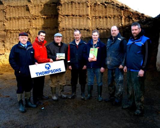Basil Bailey from Thompsons, left, with Volac forage specialist Noel McGrath discussing silage making in all weathers with  Ronnie Killen and sons Geoffrey, Richard, Stuart, Graeme. As farmers and contractors the Killen family used Ecosyl additive to make good silage despite  the worse summer weather in a generation across the north west.