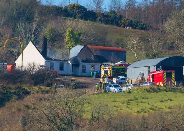 Emergency services on the scene of the house fire in Co Fermanagh