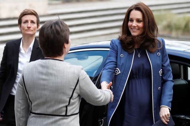 The Duchess of Cambridge is met by Dr Mary-Clare Parker, as she arrives to visit to the Royal College of Obstetricians and Gynaecologists in London