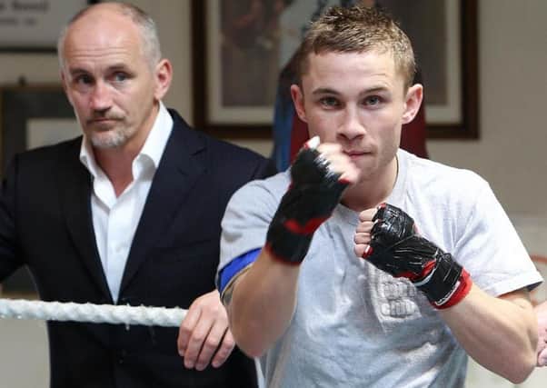 Barry McGuigan (left) acted as both manager and promoter for Carl Frampton