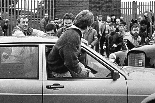 Two British Army corporals stray into an IRA funeral of Kevin Brady in Andersonstown. Picture: Pacemaker