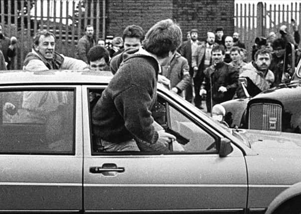 Two British Army corporals stray into an IRA funeral of Kevin Brady in Andersonstown. Picture: Pacemaker