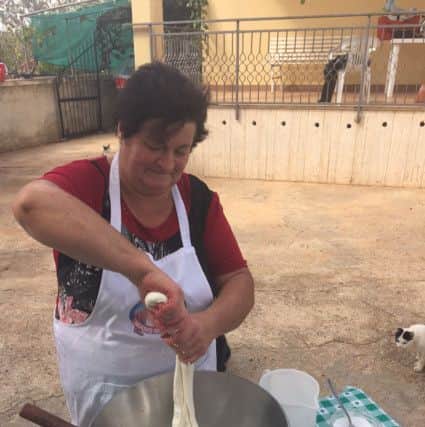 Anna Casulli making mozzarella at her farm on the outskirts of Alberobello.