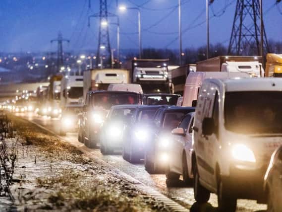 Traffic queueing to leave the M62 motorway ahead of junction 24 after the road was closed between junctions 21 and 24 as extreme weather continued to wreak havoc.