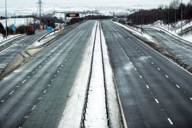 The empty M62 motorway near junction 24 after the road was closed between junctions 21 and 24 as extreme weather continued to wreak havoc