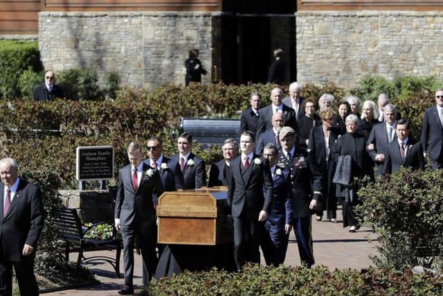 The casket of the Rev Billy Graham is moved during a funeral service at the Billy Graham Library on Friday, March 2, 2018