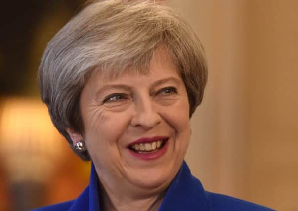 Theresa May said both the UK and Ireland are committed to no hard border
