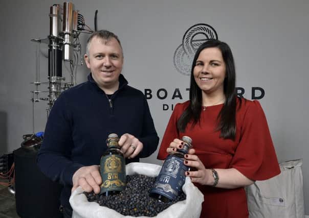 Distillery owner Joe McGirr with Jenna Mairs of WhiteRock Capital Partners
