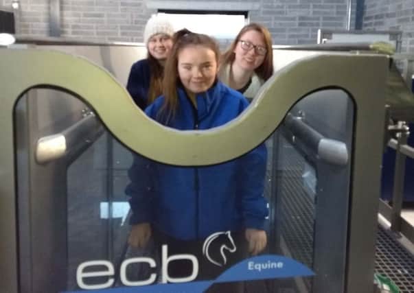 Aimee Donaldson (Banbridge), Rebecca Reddin (Dublin) and Emmee Matheson (Banbridge) testing out the treadmill