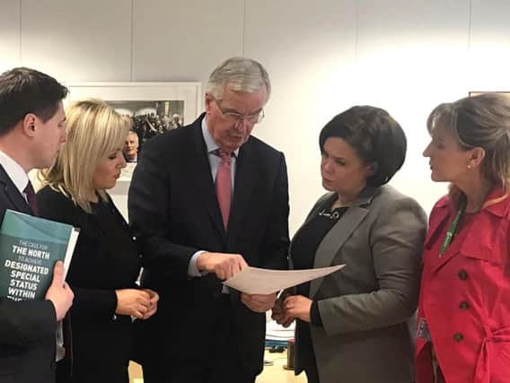 Handout photo from the Twitter feed of Sinn Fein of (left to right) of MEP Matt Carthy, Michelle ONeill, EU chief negotiator Michel Barnier, Mary Lou McDonald and MEP Martina Anderson, during a meeting in Brussels on Monday
