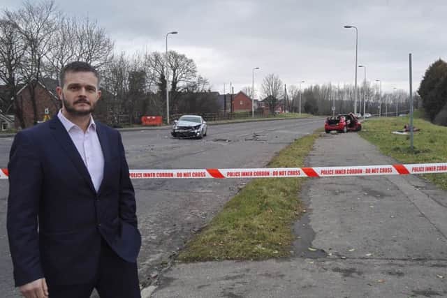 Robbie Butler MLA at the scene on the crash on Knockmore Road on Tuesday afternoon.