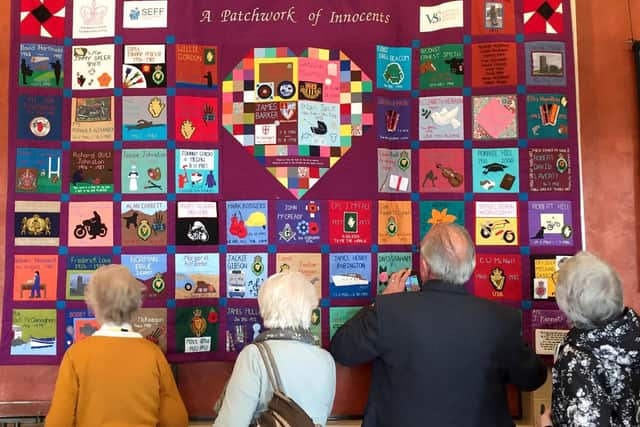 A memorial quilt telling stories of Troubles victims which is among a number on display at Stormont.