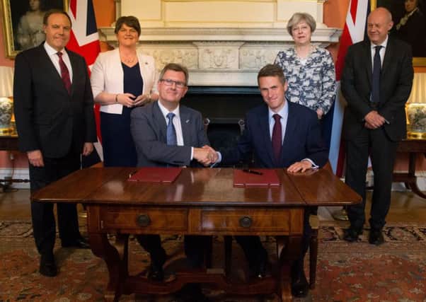 DUP leaders sign deal with the Conservatives in 2017. But they did not strip Sinn Fein of the power to collapse Stormont