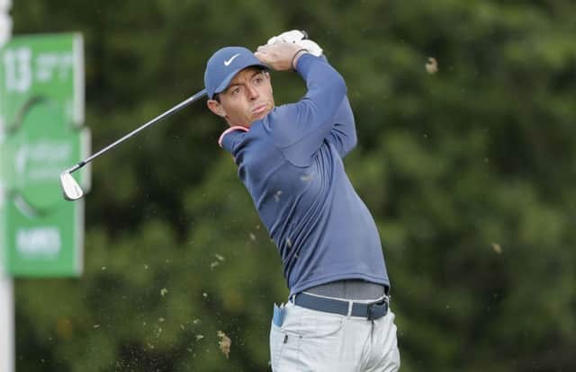Rory McIlroy tees off on the 13th hole during the first round of the Valspar Championship.