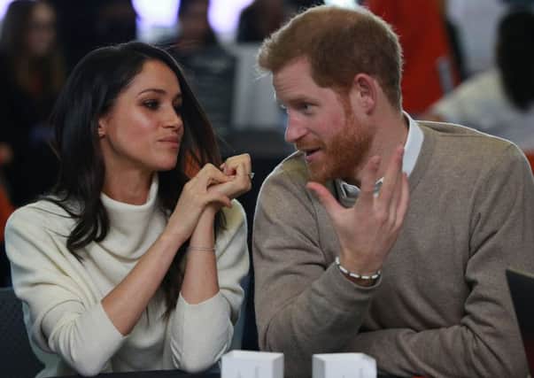 Prince Harry and Meghan Markle take part in an International Women's Day event at Millennium Point in Birmingham