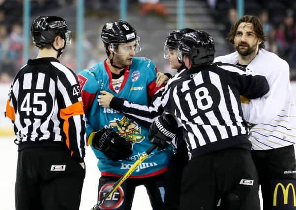 Belfast Giants Spiro Goulakos gets to grips with Nottingham Panthers Dan Spang during  last nights game at the SSE Arena