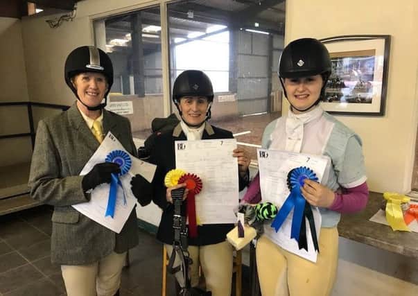 Wendy Forsythe, Nichola Wray and Katie Wray with their rosettes and prizes at Knockagh View