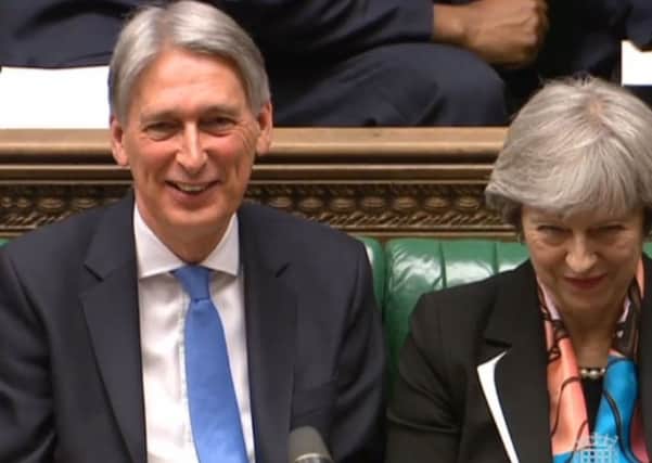 Brighter times ahead Mr Hammond hinted but pressure still on services