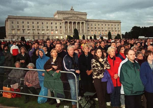 Crowds stand in front of Parliment buildings during Luciano Pavorotti's open air concert at Stormont Castle in Belfast