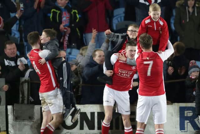 Larne celebrate after beating Ballymena United in the last eight