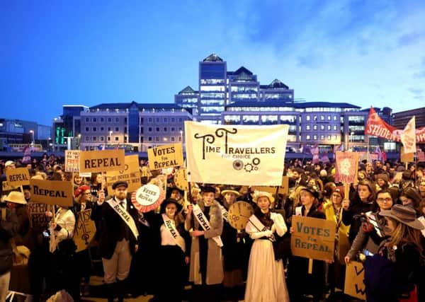 Pro choice participants gather outside The Custom House in Dublin for a march through city centre calling for the repeal of the Eighth amendment to the Irish constitution. Photo: Niall Carson/PA Wire
