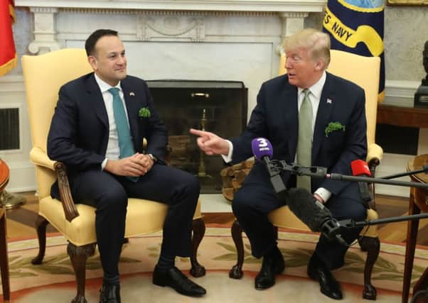 US President Donald Trump as he meets and Irish Taoiseach Leo Varadkar for talks in the Oval Office of the White House in Washington DC, USA. PRESS ASSOCIATION Photo. Picture date: Thursday March 15, 2018. See PA story IRISH Taoiseach. Photo credit should read: Niall Carson/PA Wire