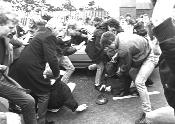 Republican mob attacks two corporals on this day in 1988, shortly before they were shot dead by the IRA
