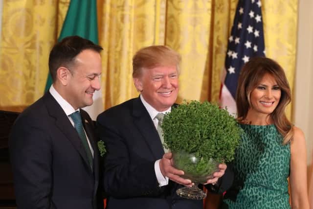Irish Taoiseach Leo Varadkar presents US President Donald Trump with a bowl of shamrock as Melania Trump looks on during the annual presentation ceremony at the White House in Washington DC, USA. . Photo: Niall Carson/PA Wire