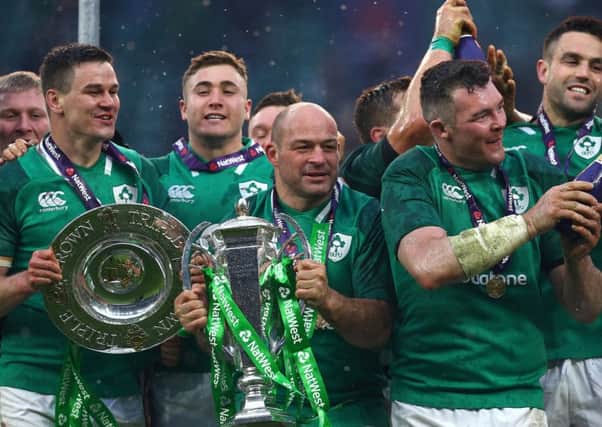 Ireland's Rory Best (centre) celebrates with the trophy after winning the grand slam during the NatWest 6 Nations match at Twickenham Stadium, London. PRESS ASSOCIATION Photo.