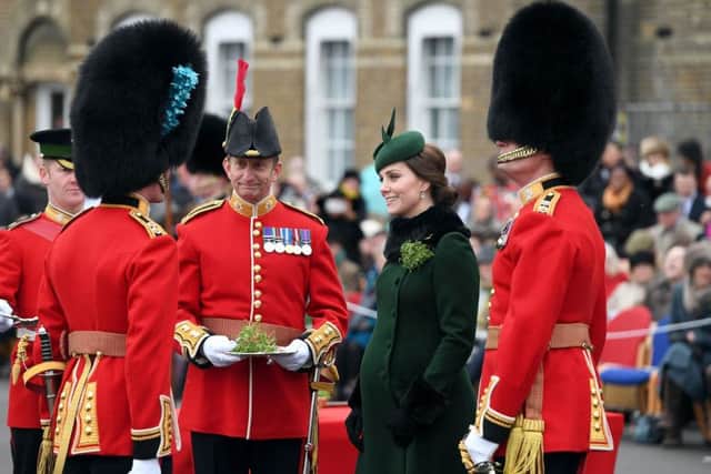 The Duchess of Cambridge attends the regiment's St Patrick's Day parade at Cavalry Barracks in Hounslow, to present shamrock to officers and guardsmen of 1st Battalion the Irish Guards. PRESS ASSOCIATION Photo. Picture date: Saturday March 17, 2018. See PA story ROYAL Cambridge. Photo credit should read: Andrew Parsons/Sunday Times/PA Wire