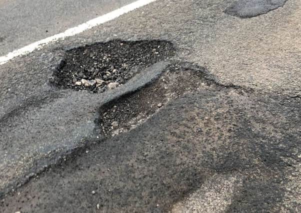 Potholes are an increasingly common feature of our roads after a very cold winter