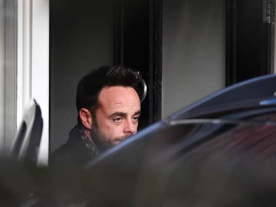 Ant McPartlin leaving a house in west London after he was interviewed by police on the same day it was revealed his TV presenting partner Declan Donnelly will host their programme Saturday Night Takeaway without him