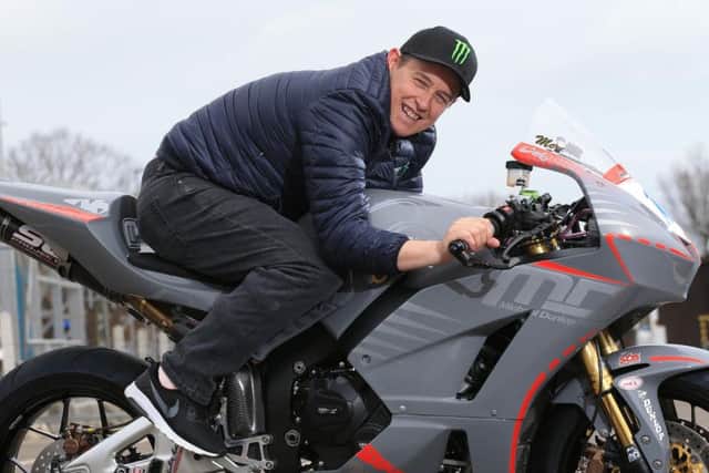 Morecambe's John McGuinness will compete in the Supersport races at this year's Isle of Man TT for Michael Dunlop's MD Racing team.