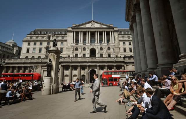 File photo dated 30/07/14 of the Bank of England in London, as interest rates were expected to remain on hold as signs of slowing economic growth and a cooling housing market ease pressure on the Bank of England for an imminent hike. PRESS ASSOCIATION Photo. Issue date: Thursday October 9, 2014. The Bank rate has been on hold at 0.5% for more than five years and governor Mark Carney has indicated that the time for an increase is nearing amid the recovery. See PA story ECONOMY Rates. Photo credit should read: Anthony Devlin/PA Wire