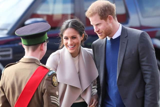 Prince Harry and Meghan Markle arrive for a visit to the Eikon Exhibition Centre in Lisburn where they are attending an event to mark the second year of youth-led peace-building initiative Amazing the Space.