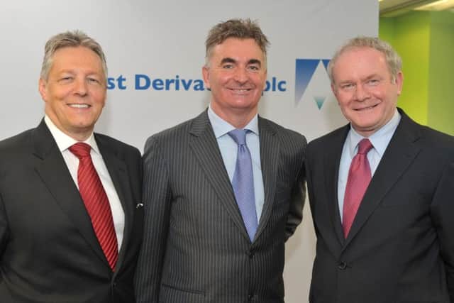 First Derivatives CEO Brian Conlon (centre), pictured with former first minister Peter Robinson and deputy first minister Martin McGuinness, features at third in the list